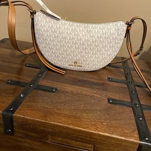 Authentic Michael Kors Half Moon Crossbody.